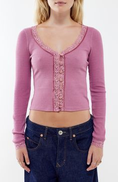 A button-and-loop closure secures the front of this lace-trimmed cardigan textured with soft, curve-hugging ribbing. 20" length (size Medium) Exclusive retailer Front button-and-loop closure V-neck Long sleeves 60% cotton, 40% polyester with 93% nylon, 7% elastane contrast Machine wash, line dry Imported Girly Fall Fashion, Long Sleeve Button Up, Unique Clothing Pieces, Twee Clothes, V Neck Cardigan Outfit, Long Sleeve Outfit Ideas, Button Up Cardigan Outfit, Flora Outfits, 2000s Cardigan