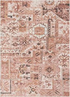 an orange and beige rug with many different designs on the carpet, including arrows and circles