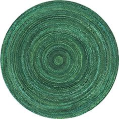 a circular rug with green circles on it