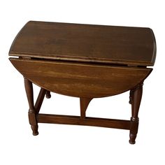 an old wooden desk with one drawer open