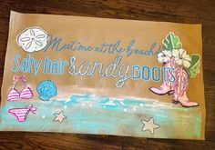 a hand painted sign that says, meet me at the beach salty hair and boots