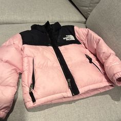 The North Face Retro 1996 Retro Nuptse Coat. Used 3t. Pink And Black Used. Pink And Black North Face Puffer, Dressing For Winter Cold Weather, Christmas Girly Wishlist, Pink Hooded Puffer Jacket For Streetwear, Sporty Pink Hooded Puffer Jacket, Pink Puffer Jacket With Pockets For Outdoor, Pink Puffer Outerwear For Outdoor, Pink Puffer Jacket For Winter Outdoor Activities, Pink Puffer Outerwear For Streetwear