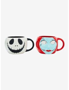 two mugs with faces painted on them, one is red and the other is blue