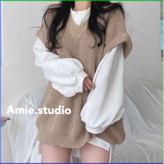 Amie.studio|Korean Style Round Neck Puff Sleeves White Top Loose Knitted Vest

Color _ Milk Tea/Grey

Size _ One Size _ One Size

Vest|Length 60 Bust 114
White Top|Front Length 71 Back Length 77 Shoulder Width 60 Sleeve Length 50 Bust 112


✨A Must-Have Set✨
Hundreds Of Popular Reviews Are Super High!

Whether It Is A Vest Or A White Top Inside, It Is Worth Starting
The Vest Has A Dropped Shoulder Design
The Visual Effect Is Very Good With The Puffy Sleeves With The White Top Inside
It Is Also Super Versatile To Wear Separately From Other Clothes In The Wardrobe

Can Be Worn With Shorts To Create Missing Lower Body
Or You Can Wear Loose Or Slim Trousers
I Like This Set Of Boots And It Looks Great🥨

Gray, Milk Tea Colors Are Super Versatile And Durable
Both Colors Are Smart Decisions👍🏻