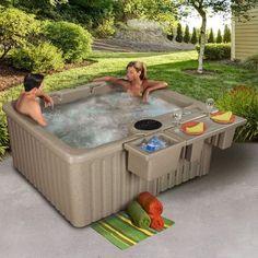 two people in an outdoor hot tub