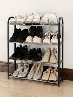 a rack with several pairs of shoes on it