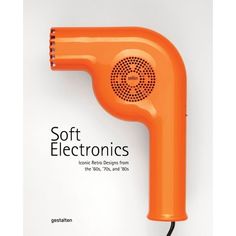 an orange electric hair dryer sitting on top of a white sheet with the words soft electronics written below it