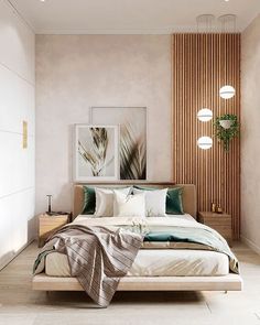 a bed sitting in a bedroom next to a wooden headboard