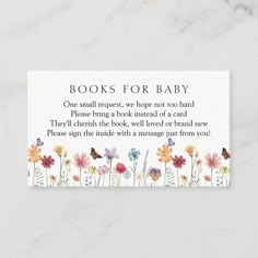 a baby book request card with flowers and butterflies on the front, reads books for baby one small request, we hope not too