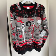 a sweater with skulls and stars on it