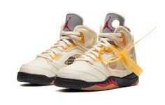 The Air Jordan 5 Retro SP PS 'Sail' is a special edition shoe made for little kids by world-renowned designer Virgil Abloh. This unique take on the classic Retro 5 model features semi-translucent textile in an ivory hue, with a reflective silver finish on the tongue. The left tongue boasts a large circular cut-out, and these same details can be seen on the midfoot and collar. Other signature Virgil touches include a plastic zip tie and lines of Helvetica text on the medial quarter panel. To top Off White Designer, Jordan V, Nike Air Jordan 5, Jordan 5 Retro, Air Jordan 5 Retro, Air Jordan 6, Jordan 11 Retro, Air Jordan 5, Air Jordan 11