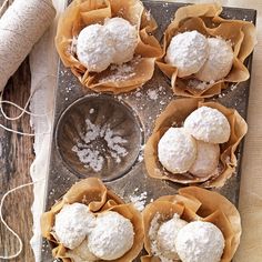 several pastries are sitting on a baking tray