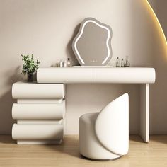 a white dressing table with a mirror and stool next to it on a hard wood floor