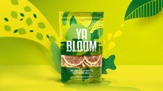 a bag of yo bloom fruit on a green and yellow background with leaves around it