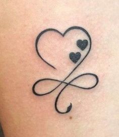 a heart tattoo with two hearts on it