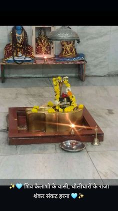 the shrine is decorated with flowers and candles