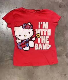 Hello Kitty Rockstar I  m With The Band Shirt Outfit  Shirt Outfit Idea Easy 30 day return policy Hello Kitty Tees, Outfit Ideas Band Tees, Outfits With Band Tees, Cute Thrift Finds, Union Jack Outfit, Band Tees Aesthetic, Thrift Finds Aesthetic, Vintage Thrift Finds, Hello Kitty Clothes Aesthetic