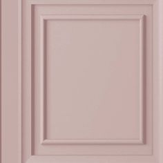 a close up view of the back side of a cabinet door with pink paint on it