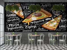 a restaurant wall mural with pizzas on it