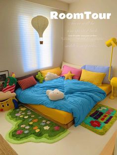 the room is decorated in bright colors and has a bed with pillows on top of it