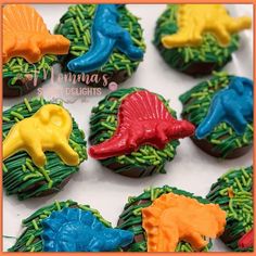 dinosaur cupcakes decorated with royal icing