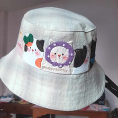 *Before purchasing, it is recommended to watch the video via the link below. https://youtu.be/pjzLpTylDko?si=vo4emY5Chv2mvzRs You'll receive a bucket hat pattern with a cute cat around the body of hat, designed by happyquiltday. This video will show you the applique and drawing a cat's face using acrylic paints. and sewing and assembling various parts according to the steps There are no written instructions. Instead, you will receive instructions via video. You can download it immediately after payment. If there is a problem downloading the format please message me. * Patterns can be printed in A4 size (3 sheets) and set to 100% or fit to the page. *All designs are created by Happyquiltday Please beware of pilferers copying our designs. Happy Quilting Day! * Happyquiltday pattern Some desi Cute Handmade Cotton Hat, Bucket Hat Designs, Custom Bucket Hats, Bucket Hat Pattern, Cat Applique, Bucket Hat Design, A Cute Cat, Using Acrylic Paint, Bucket Hats