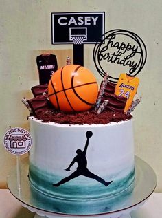 a birthday cake decorated with an image of a basketball player