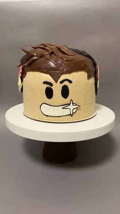 a cake that has been made to look like a man's face