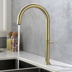 a kitchen faucet with water running from it