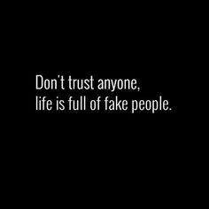 a black and white photo with the words don't trust anyone, life is full of fake people