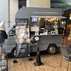 a food truck parked inside of a building