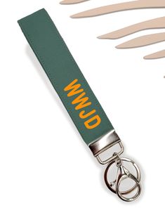 This What Would Jesus Do keychain fob will be perfect for every person on the run!  DETAILS: * 100% Cotton Fabric * This key fob is 7 1/2 inches (in loop form, 5.5 inches) and will easily fit on your wrist. * Width is 1 inch *Silver metal key ring, silver Keyfob hardware *Thick, strong, firm, and safe *Sturdy double interfacing lining for durability *Letters pressed on with durable permanent vinyl *1" Key Ring included * Hook makes it easy to hang on bags **Ready to gift! You don't have to pack - we send it in gift wrapping for you! If you want your key fob to include a certain detail in the fabric please include a note with your order and we will do our best to accommodate you! * Handmade. * Visit our shop for more key fobs and other fun stuff!        https://www.etsy.com/shop/annstylesto Multicolor Lanyard With Key Clip For Gift, Multicolor Rectangular Keychain With Key Clip, Multicolor Lanyards With Key Clip For Everyday Use, What Would Jesus Do, Handmade Keychain, Keychain Wristlet, Keychain Fob, On The Run, Wristlet Keychain