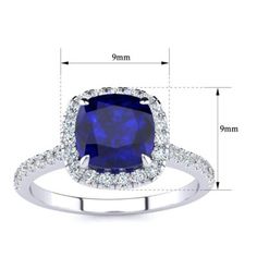 This sapphire ring features one 7mm cushion cut created sapphire gemstone. It is surrounded by 38 sparkling diamonds totaling 1/2 carat in I-J color, I1-I2 clarity. Total carat weight is approximately 2 carats. This ring is in sterling silver. | Belk & Co Lab Created 2 Carat Cushion Cut Created Sapphire and Halo Diamond Ring In Sterling Silver, White, 8.5 Cushion Cut, Vegas Wedding, Halo Diamond Ring, Sapphire Gemstone, 2 Carat, Sparkle Diamonds, Halo Diamond, Sapphire Ring, Halo