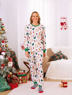 Coordinating family sleepwear in fun Christmas cookie pattern.
* Please add each size separately to your shopping cart
* Each size includes 1 set (1 top and 1 pant), or 1 jumpsuit or 1 pet bandana.
* For children's safety, pajamas should be snug-fitting or flame-resistant. These kids' and babies' pajamas are flame-resistant. 
* Festive Christmas cookie pattern
* Polyester and spandex blend for comfort
* Long sleeves and round neckline
* Casual style suitable for all occasions
* Suitable for winter season
* Imported product with high-quality materials
* Designed by PatPat, your trusted supplier for family matching outfits Pajamas White, Pajamas Matching, Christmas Pj, Family Pajama Sets, Best Christmas Cookies, Christmas Pjs, Matching Family Pajamas, Family Photo Outfits, Family Pajamas