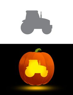 an orange pumpkin with a tractor on it and the shadow of a truck behind it