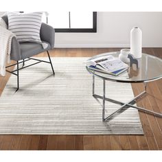 Elevate your home décor with the O21 Cream Textured rug. The subtle yet stylish design adds depth and sophistication to any room. Made with 100% polyester, this rug is not only soft to the touch but also durable and easy to maintain. Its family and pet-friendly features make it perfect for busy households, and its shed-resistant and vacuum-friendly qualities ensure that it looks great for years to come. Clean up spills and stains easily with a damp cloth and mild soap and water, and use a rug pa Textured Rug, Stripe Rug, Abstract Area Rug, Rugs And Mats, Rug Texture, Striped Rug, Throw Rug, Small Living, Indoor Rugs