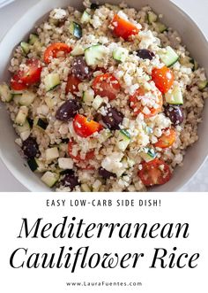 mediterranean cauliflower rice with black olives and cucumbers in a white bowl