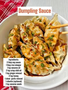 dumpling sauce in a white bowl with chopsticks