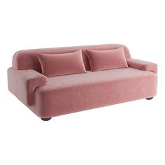 a pink couch sitting on top of a white floor