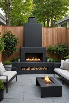 an outdoor fireplace surrounded by furniture and trees