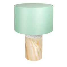 a table lamp with a light green shade on the top and white marbled base