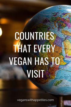 a globe that has the words countries that every vegan has to visit on it