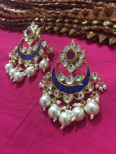 *It's Handmade Indian Ethnic Kundan Chandbali Designer Fashion Earrings with Pink and Blue Combination. *It's Multi Color Kundan Stones Settings and 22k gold Plating as shown in picture. *It is Real Kundan Design with Antique Touch and 2 inch long with hangings of pearls. *Our all jewelry is made from semiprecious stones and beads. *WARRANTY: ITS GENUINE HANDMADE JEWELRY AND WE ARE GIVING LONG LIFE WARRANTY FOR OUR ALL ITEMS. All of our Kundan Jewelry is 100% handmade with ancient Kundan stone s Traditional Handmade Blue Danglers, Blue Handmade Danglers For Festive Occasions, Handmade Blue Danglers For Wedding, Blue Bohemian Jhumkas For Festive Occasions, Blue Earrings For Festivals Gift, Blue Earrings For Festivals And Gifts, Festive Blue Bohemian Jhumkas, Festive Bohemian Blue Jhumkas, Bohemian Blue Danglers For Wedding