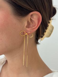 Bows make everything better! We love this long, gold plated bow earrings Alv Jewels, Long Bow, Bow Earrings, Shell Necklaces, Pearl Studs, How To Make Bows, Ring Bracelet, Jewelry Trends, Earrings Gold