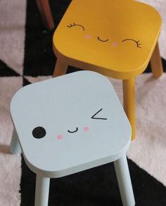 a yellow and white chair sitting next to each other