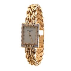 Patek Philippe La Flamme Gold Diamond Ladies Quartz Watch 4835/3. Watch is in great preowned condition, set on a original 18k gold bracelet. Weighs 93 grams. BRAND: Patek Philippe MODEL: La Flamme REF: 4835/3 CASE SIZE: Case 21mm x 29mm CASE MATERIAL: 18k Yellow Gold FUNCTIONS: Hours, Minutes CONDITION: ﻿Preowned, excellent condition BOX : No PAPERS : ﻿No Watches Women Patek Philippe, Patek Philippe Women Vintage, Patek Phillipe Women, Gold Ladies Watch, Phillip Patek Watches, Patek Philippe Women, Patek Philippe Ellipse, Vintage Gold Watch, Jewelry Closet