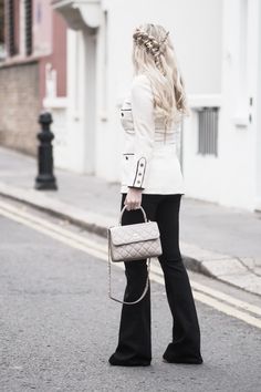 Chanel jacket, J Brand flares (http://bit.ly/2jODBaR), Chanel shoes, Chanel Trendy bag (http://bit.ly/2jlDbbV), Chanel 90’s bracelet, Chanel 90’s belt (in hair)