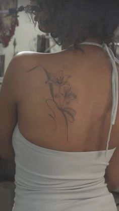 Lily Flower Tattoos, Basic Tattoos, Upper Back Tattoos, Cross Tattoos For Women, Small Pretty Tattoos, Back Of Shoulder Tattoo, Lily Tattoo, Stylist Tattoos