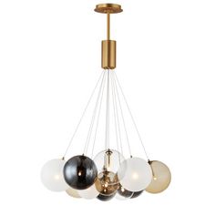 a chandelier with five globes hanging from it's brass and glass arms