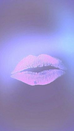 a close up of a pink lip on a purple background